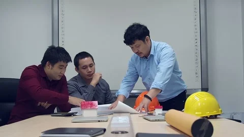 Architect discuss with engineer about project in office, architectural concept. Stock Footage 157526961