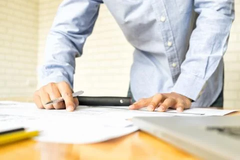 Architect drawing architectural project on blueprint, engineering concept, .. Stock Photos
