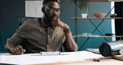 Architect drawing blueprints in office. Engineer sketching a construction Vídeo Stock 126235322