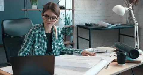 Architect drawing blueprints in office. Engineer sketching a construction Vídeo Stock 130354151