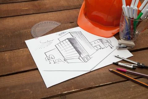 Architect drawing blueprints Stock Photos