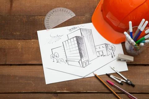 Architect drawing blueprints Stock Photos