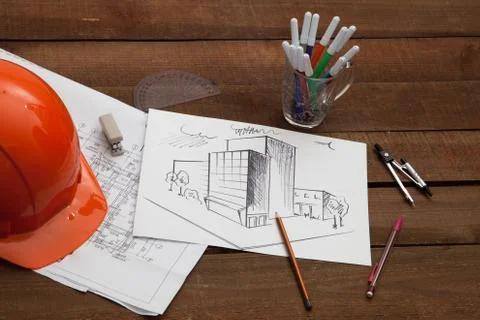 Architect drawing blueprints Stock Photos