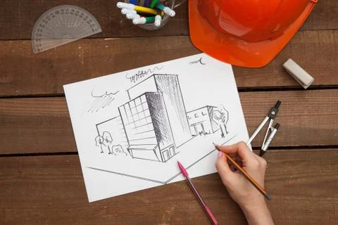 Architect drawing blueprints Stock Photos
