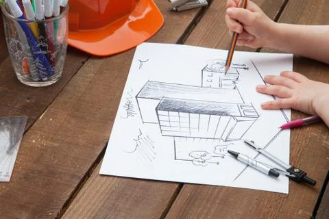 Architect drawing blueprints Stock Photos