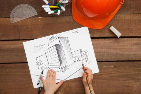 Architect drawing blueprints Stock Photos