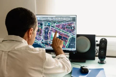 Architect drawing with cad software designing building Fotos de archivo