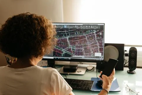 Architect drawing with cad software designing building Stock Photos