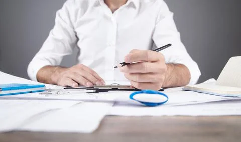 Architect drawing construction plan. Working in office Stock Photos