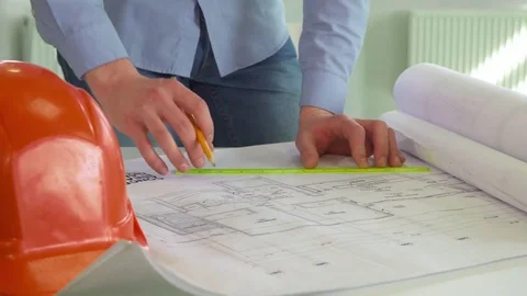 Architect draws lines on the design project Stock-Footage 73910982