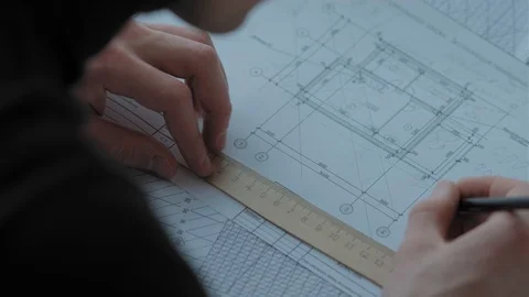 Architect draws the project using rulers and a pencil. Close up Stock-Footage 125011224