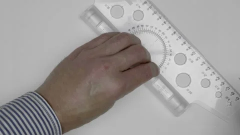 An architect easily draw parallel lines by a transparent roller ruler Stock Footage 142135442