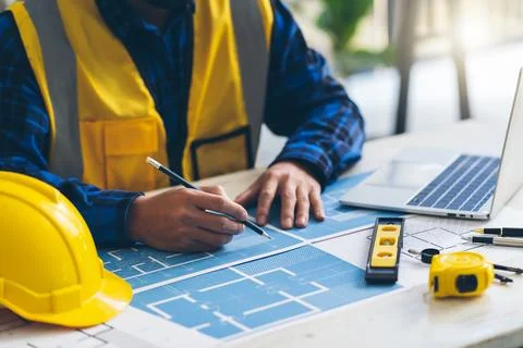 Architect Engineer Design Working on Blueprint Planning Concept. Constructi.. Stock Photos