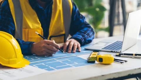 Architect Engineer Design Working on Blueprint Planning Concept. Constructi.. Stock Photos