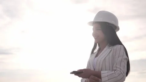 Architect, engineer, designer, clerk, white woman holding drawings Stock Footage 240301787