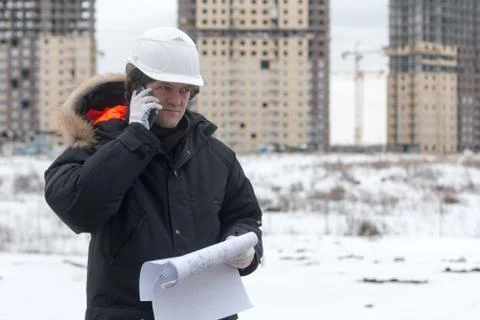 Architect, engineer, project manager or Senior engineer man talking on CB phone Stock Photos