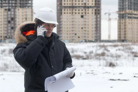 Architect, engineer, project manager or Senior engineer man talking on CB phone Stock Photos