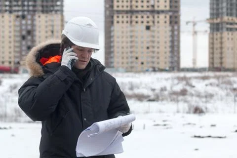 Architect, engineer, project manager or Senior engineer man talking on CB phone Stock Photos