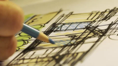Architect Engineer Sketching Blueprint with Pencil on Paper in Studio Stock-Footage 235283846