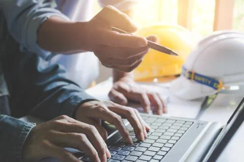Architect engineer working concept with laptop and construction tools or safe Stock Photos