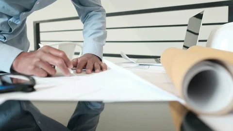 Architect engineer working on house blueprint Stock Footage 117116425