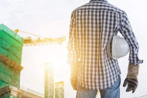 Architect engineering with clipping path working on construction site Photos