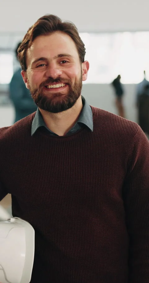 Architect, face and happy man with helmet in workplace for construction or Stock Footage 342219721