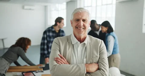 Architect, face or man in office with arms crossed, project manager or pride as Stock Footage 341377203