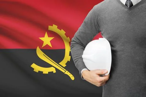 Architect with flag on background  - angola 写真素材