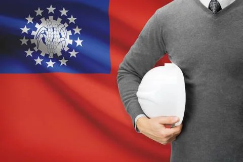 Architect with flag on background  - burma 스톡 사진