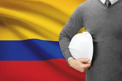 Architect with flag on background  - colombia 写真素材