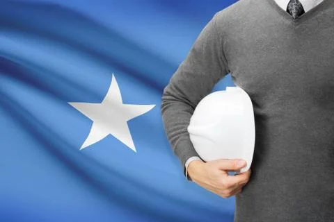 Architect with flag on background  - somalia Foto stock
