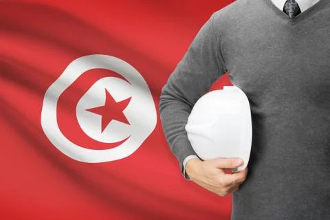 Architect with flag on background  - tunisia 写真素材
