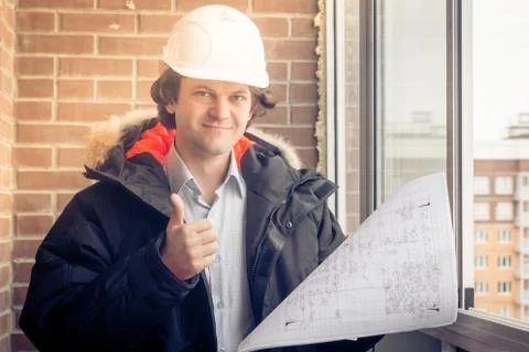 Architect giving the green light to project. Happy engeneer giving the thumbs-up Foto stock