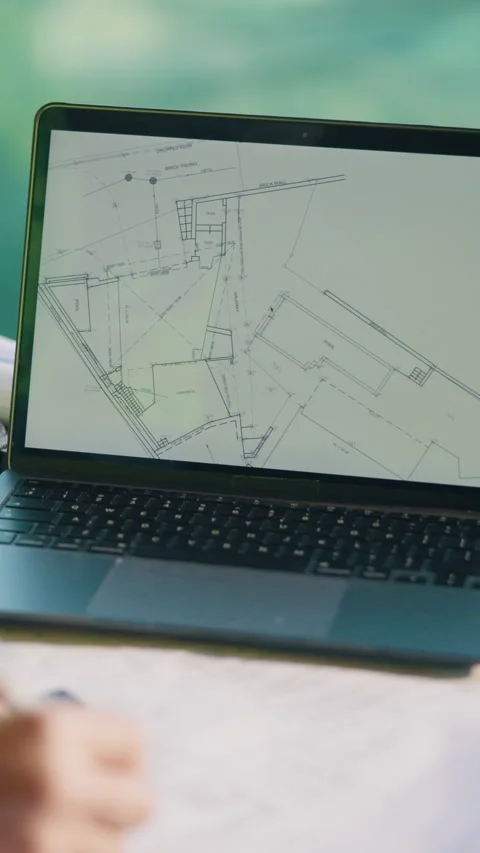 Architect, hands and blueprint with laptop screen for building design, project Stock Footage 336199178