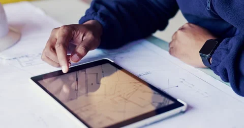 Architect, hands and blueprint on tablet screen for planning, design update or Stock Footage 336791997