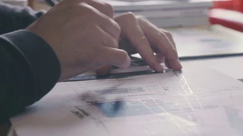Architect Hands. Ruler and a pencil in the hand of the architect Video stock 73669285