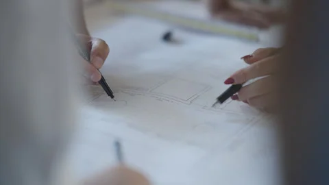Architect hands working on a sketch Stock Footage 289974907