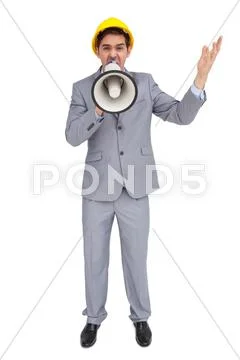 Architect with hard hat shouting with a megaphone Stock Photos