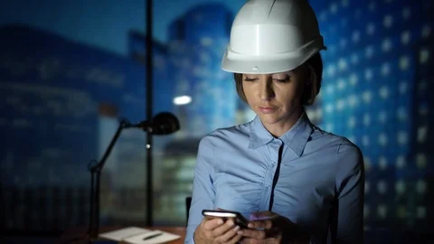 Architect in the Hardhat Using Smartphone, Construction, Building, Engineer Stock Footage 95558247