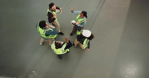 Architect, high five and huddle with above of people for meeting, construction Stock Footage 341566444
