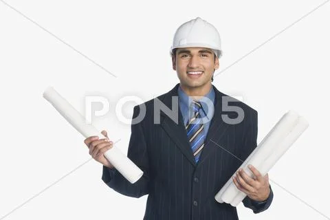 Architect holding blueprints Stock Photos