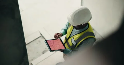 Architect, inspection and black man with tablet screen for construction or Stock Footage 337757994
