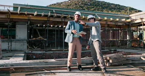 Architect, inspection and men with tablet on construction site, discussion and Stock Footage 337015101