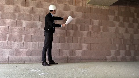 Architect inspects construction from the inside Видео 107558731