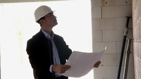 Architect inspects construction from the inside 動画素材 107560980