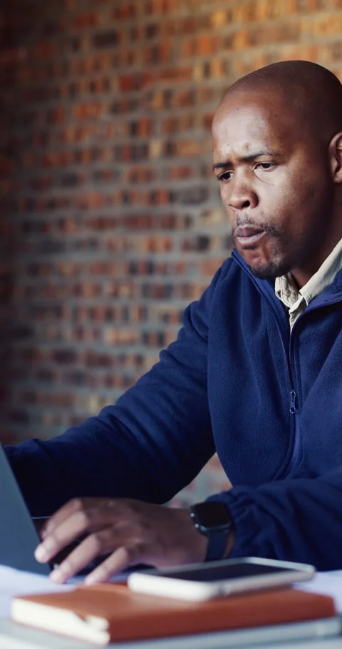 Architect, laptop and apple with black man on construction site for planning or Stock Footage 337022278
