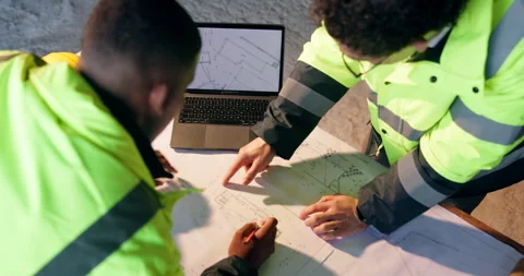 Architect, laptop screen and men with blueprint on construction site, talk and Stock Footage 337015258