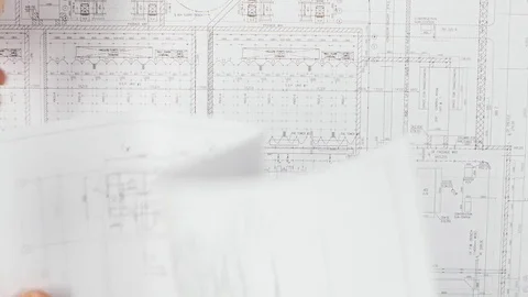 Architect looks at the data for the building's most complete building. Close up Stock Footage 73677607