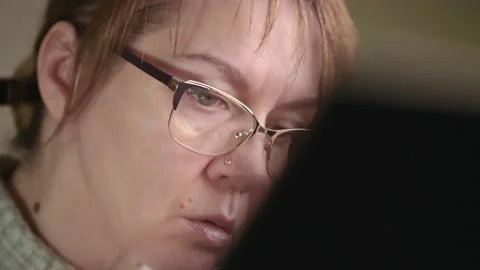 The architect makes a sketch on the board. Close-up of a woman's focused face Stock Footage 145085259